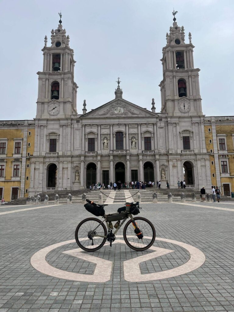 Bikepacking Portugal — Mafra Palace with loaded gravel bike